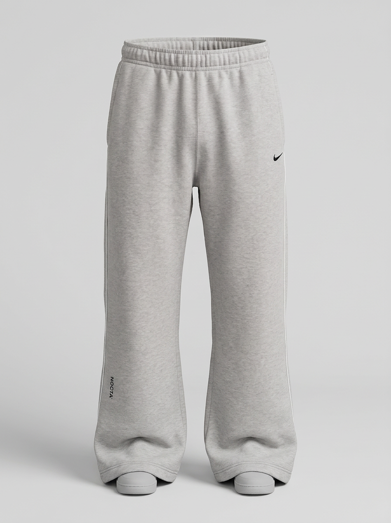 NOCTA x NIKE - PANTALONE TUTA GRIGIA FONDO AMPIO